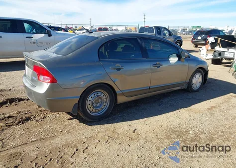 2006 Honda Civic Hybrid from USA, damaged, VIN JHMFA36226S025883